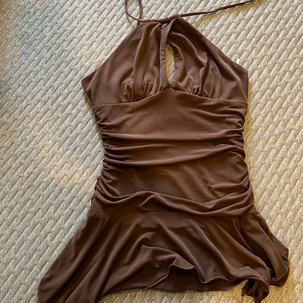 Studio Y halter top. Ties behind with cute little opening in the front.